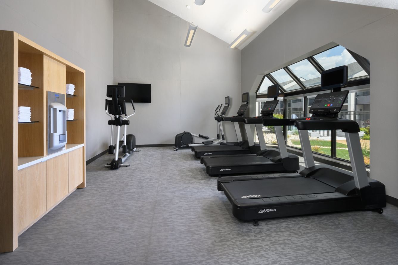 Fitness center with treadmills and cardio equipment